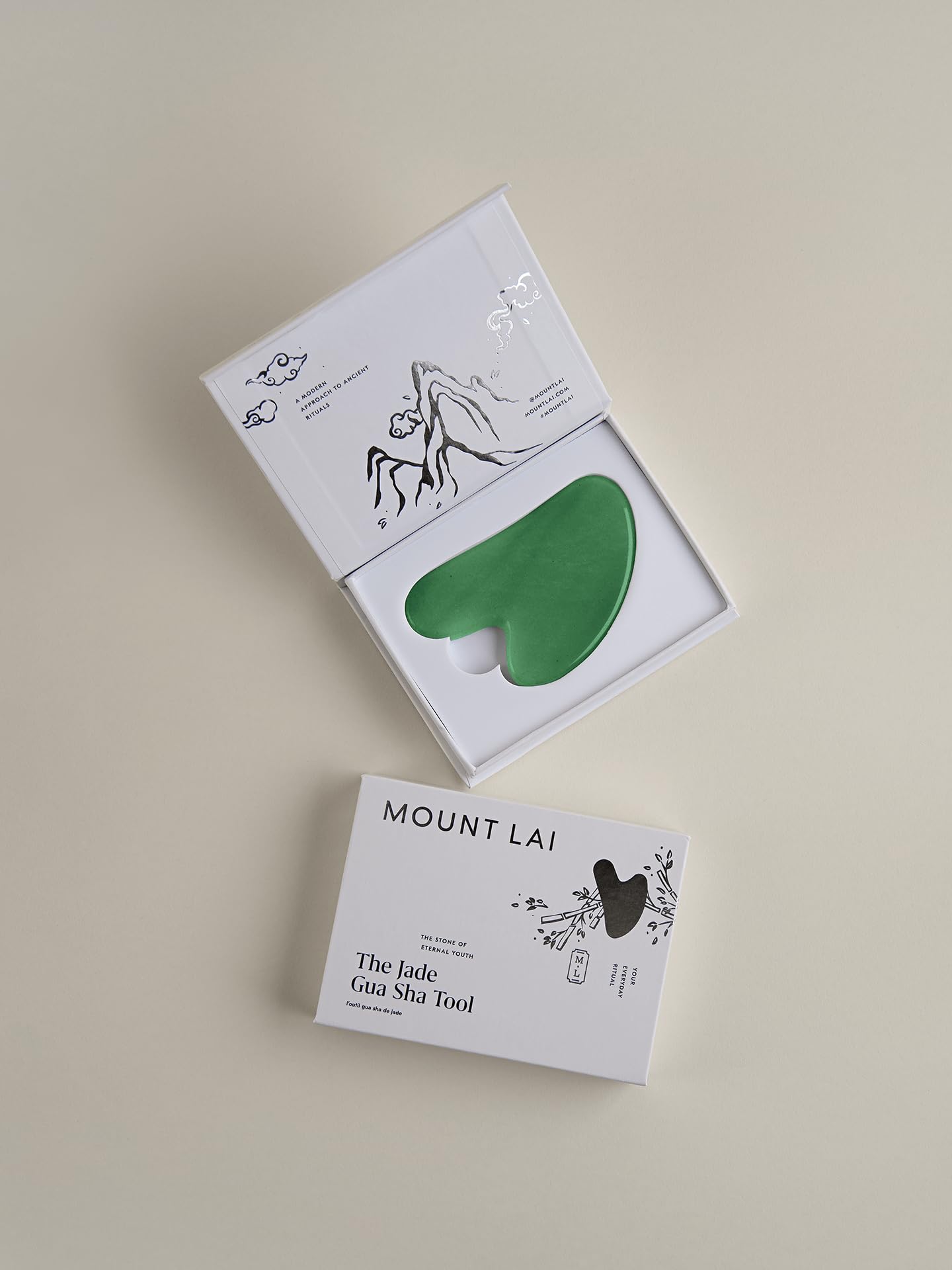 Mount Lai daily ritual with jade gua sha for balanced skincare.