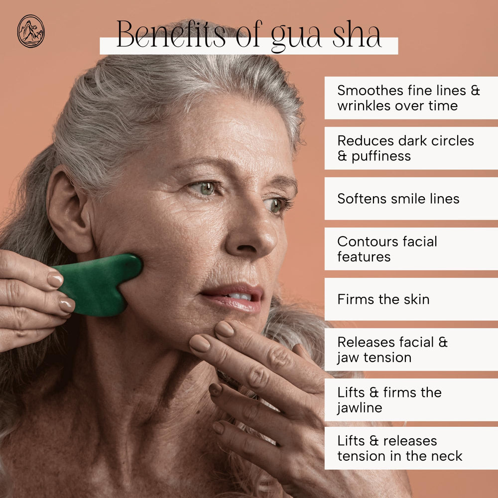 Mount Lai jade gua sha on the forehead for tension relief and uplift.