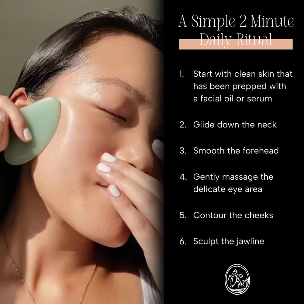 Mount Lai rose quartz gua sha in hand showing ergonomic design for easy gliding