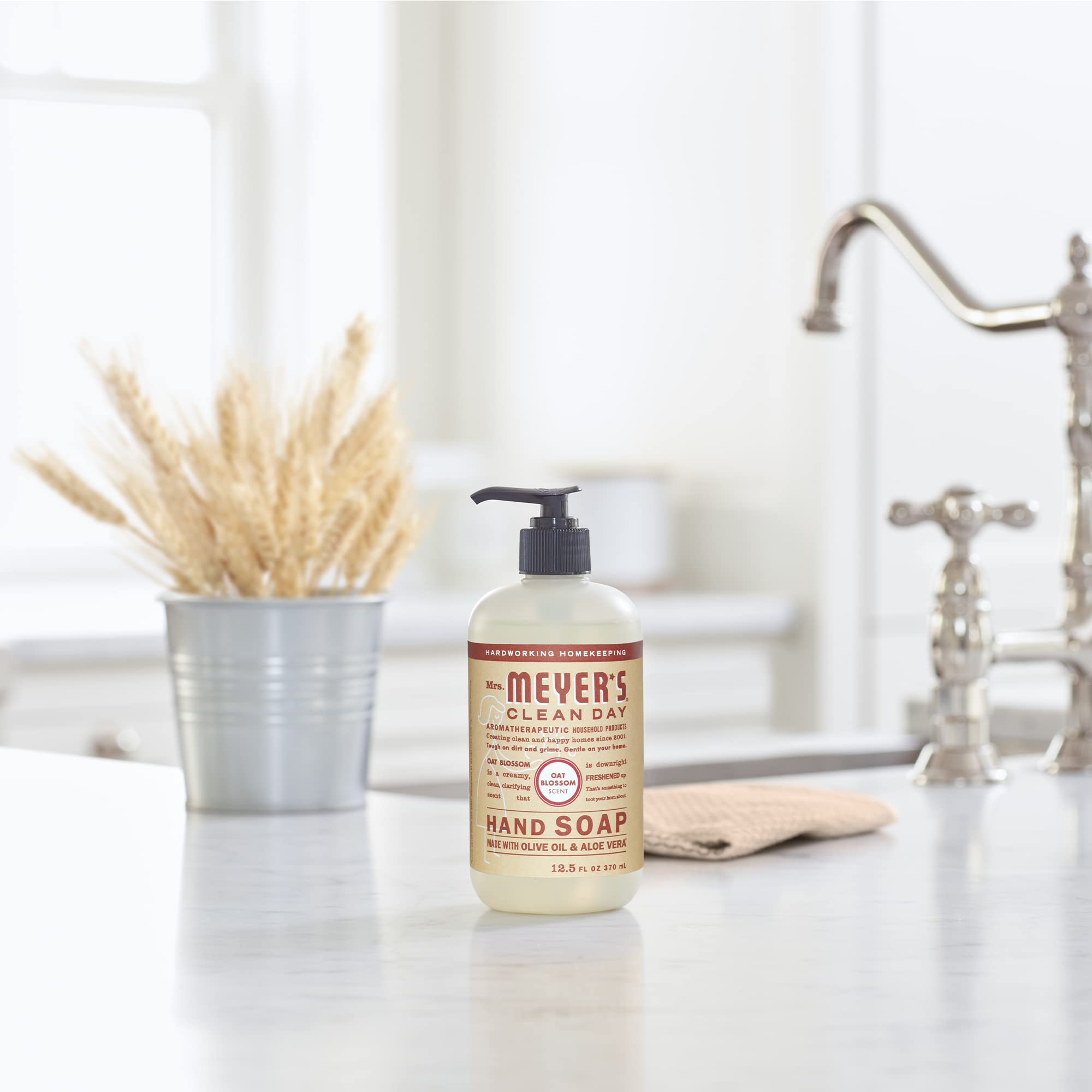 Mrs. Meyer's Clean Day Hand Soap foam on hands shows moisture