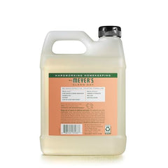 Mrs. Meyer's Geranium refill pour showing easy refilling for daily use