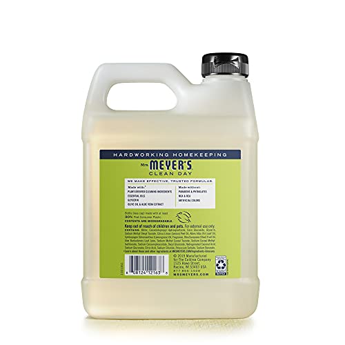 Mrs. Meyer's hand soap refill pour demonstrates convenient use and quick reseal.