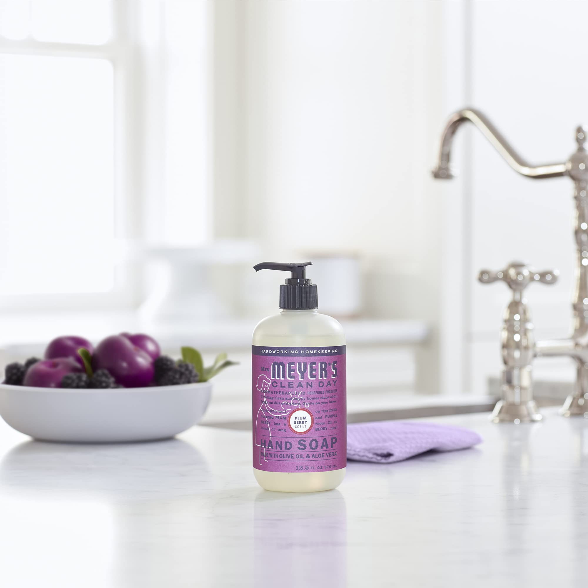 Close-up of Plum Berry scent on the bottle with juicy berry aroma.