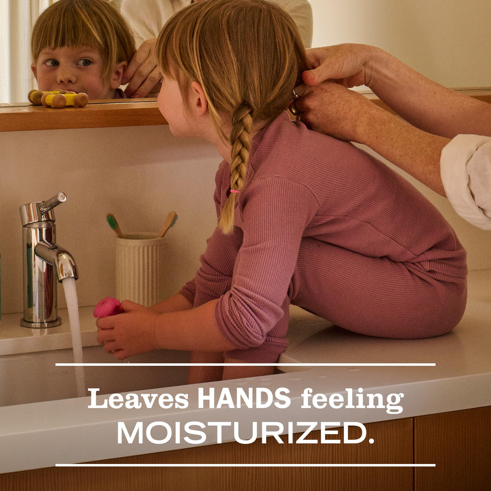 Mrs. MEYER'S lathered on hands showing gentle foam and effective dirt removal