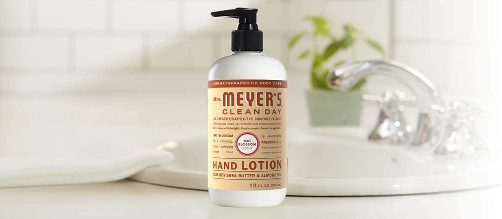 Mrs Meyer's Oat Blossom Hand Lotion lifestyle shot evokes fresh, gentle clean for kitchen or desk use.