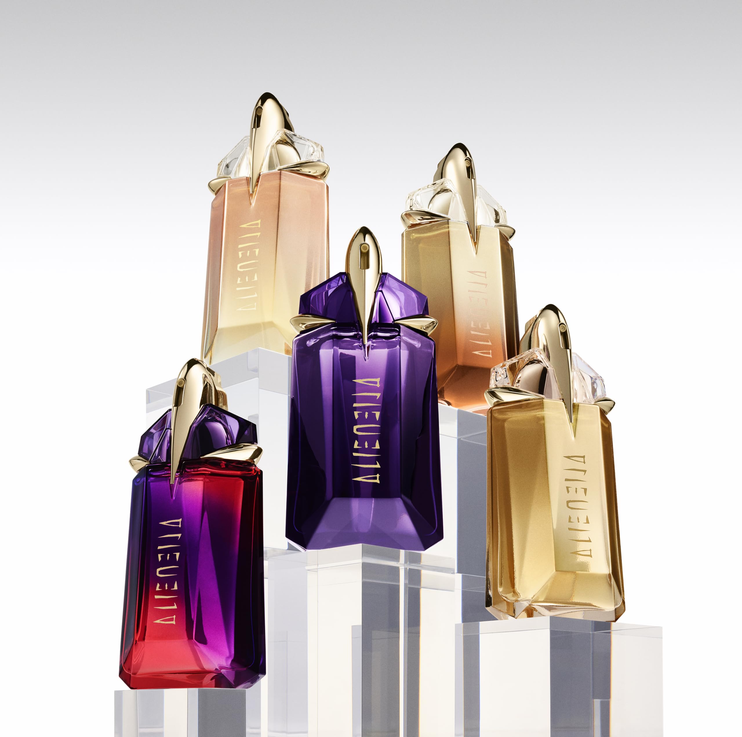 Mugler Alien star-logo display emphasizes iconic branding for premium gifting.