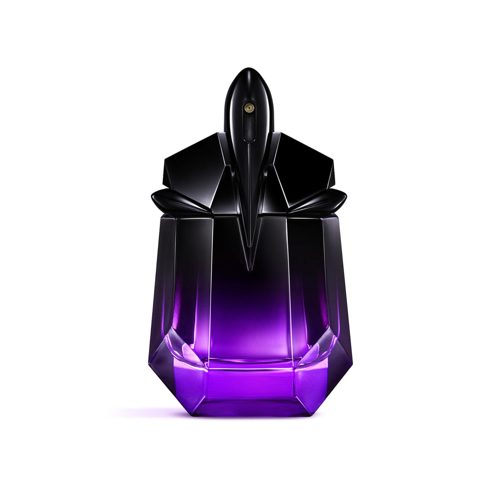 Mugler Alien Extraintense bottle close-up showing bold floral vanilla notes for evening wear