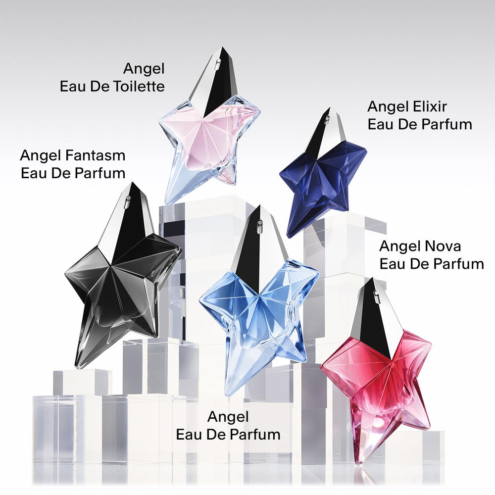 Mugler Angel spray application demonstrates effortless scent cloud around pulse points.
