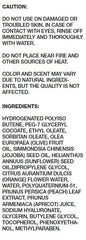 MUJI mild cleansing oil ingredients bottle highlights olive and jojoba oils hydration.