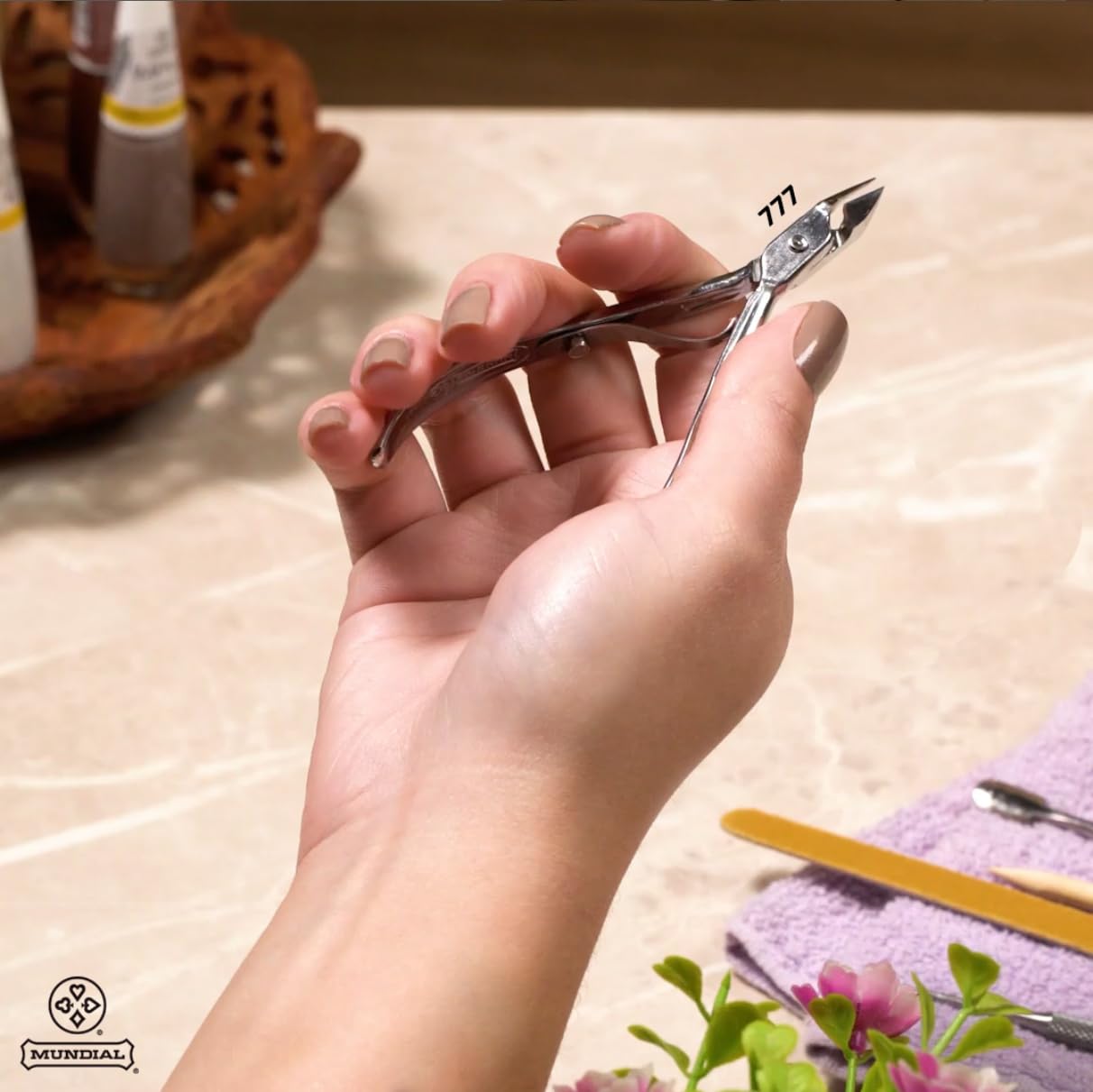 Mundial professional nail care tool, sterilizable design for hygiene and sanitation.