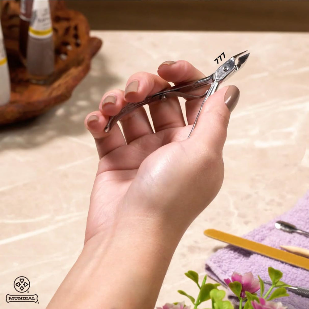 Mundial professional nail care tool, sterilizable design for hygiene and sanitation.