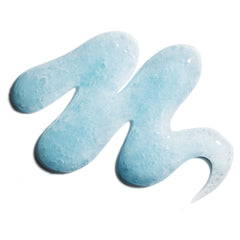 Murad Acne Body Wash date seed powder close-up signals exfoliation.