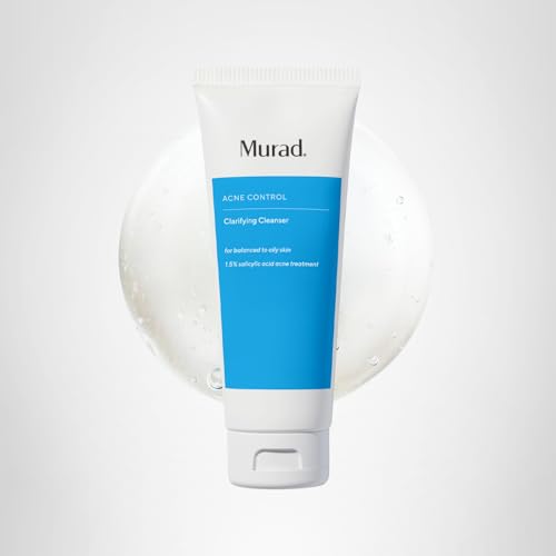Murad Clarifying Cleanser model applying gel to damp skin for cleansing routine.