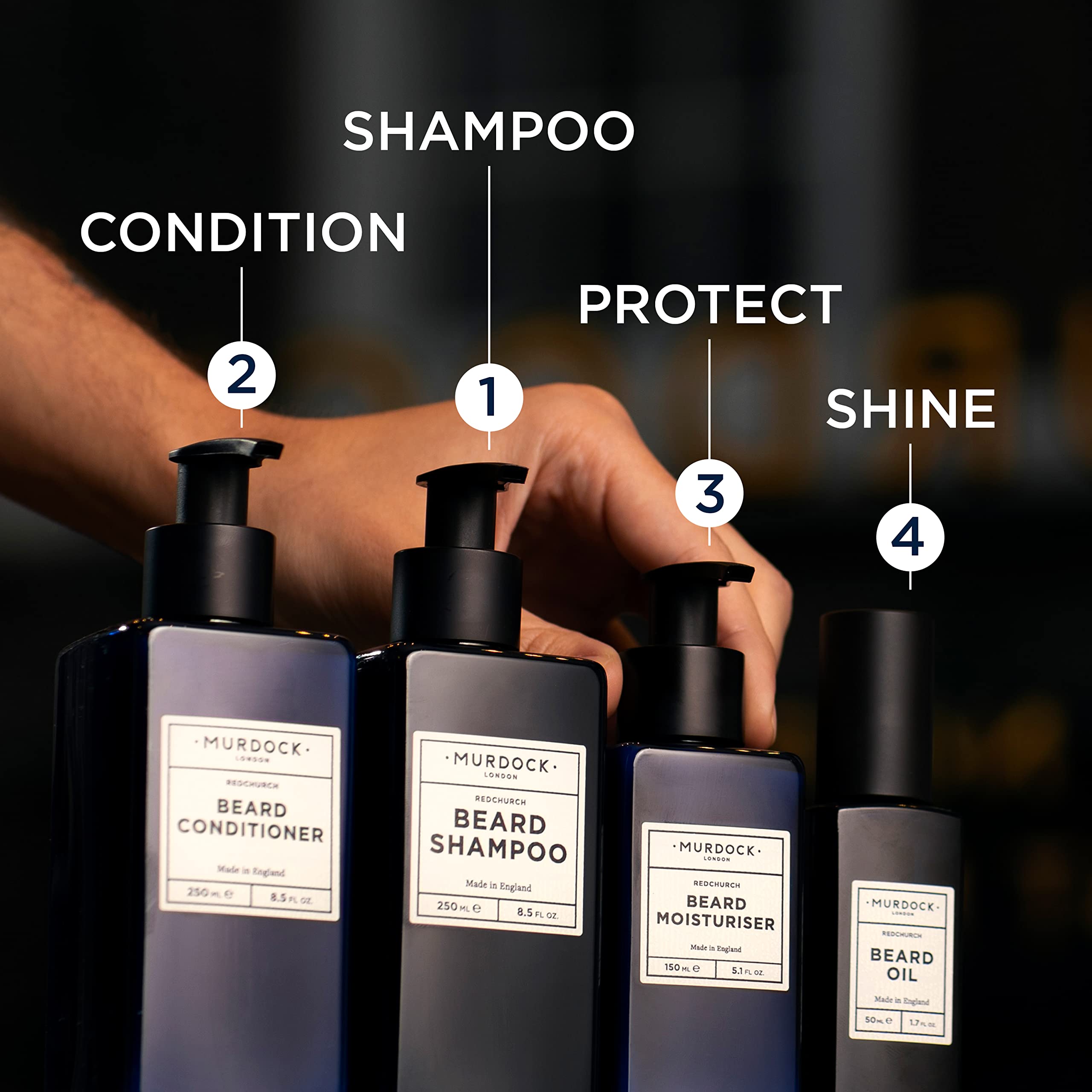 Murdock London barbershop-scene suggests professional-grade beard care.