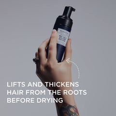 Murdock London Sea Salt Volume Mousse pump in action for controlled, even application.