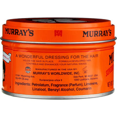 Murray's pomade being applied shows easy smoothing for defined styles.