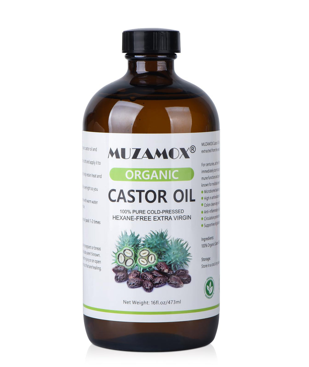 MUZAMOX castor oil amber bottle close-up highlighting purity and packaging protection.