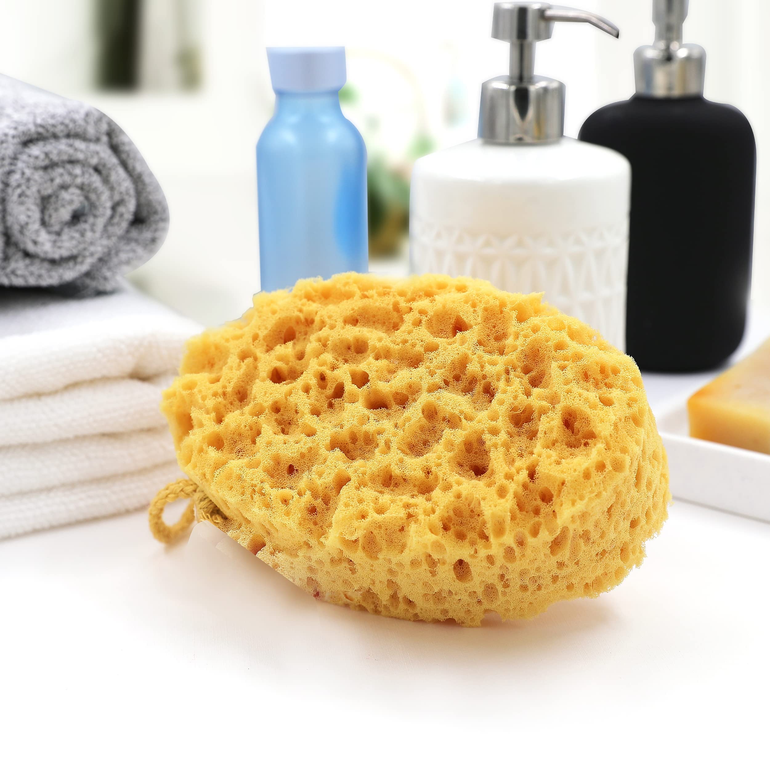 myHomeBody oval bath sponge in use for a refreshing rinse.