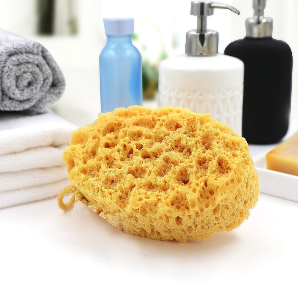 myHomeBody oval bath sponge in use for a refreshing rinse.