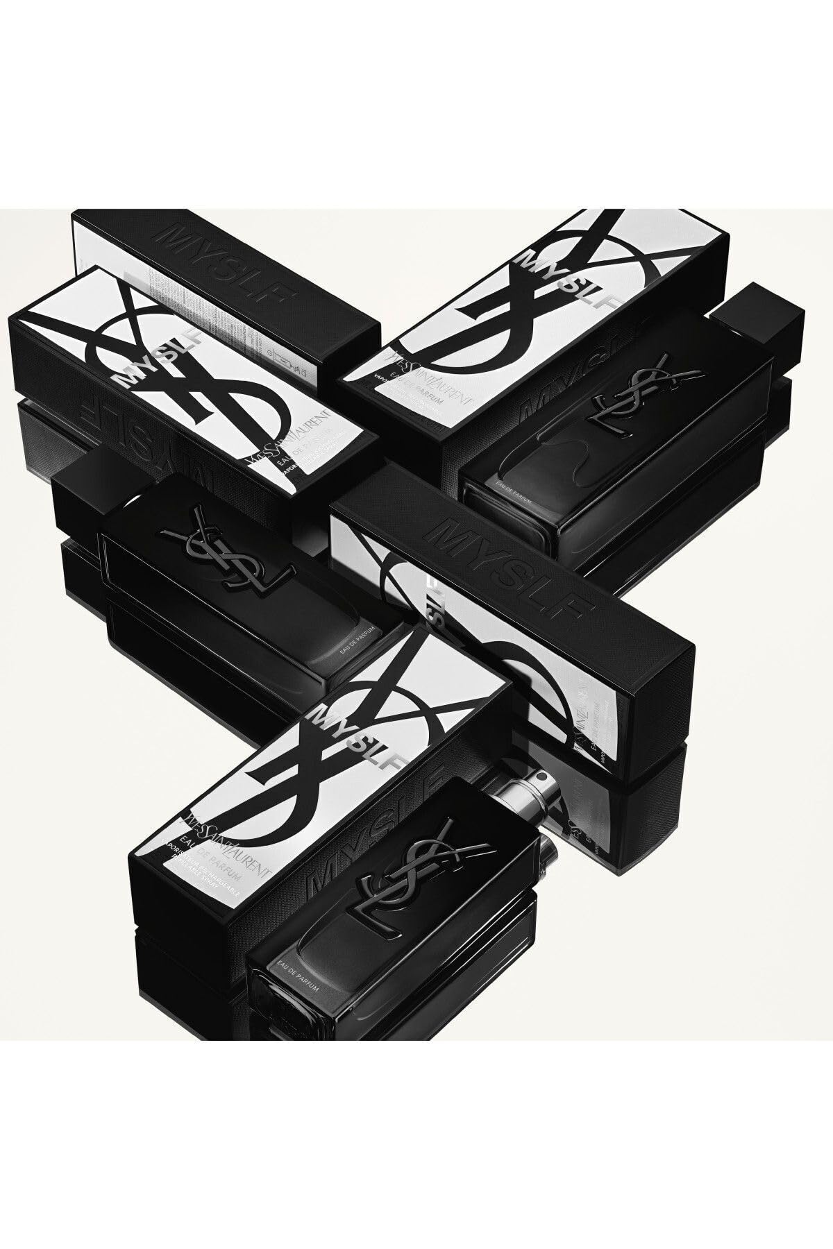 Myslf bottle worn in day-night setup by Yves Saint Laurent demonstrates versatile use.