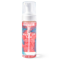 Mystic Tan Wake-Up Tan bottle close-up highlighting hydrating formula.