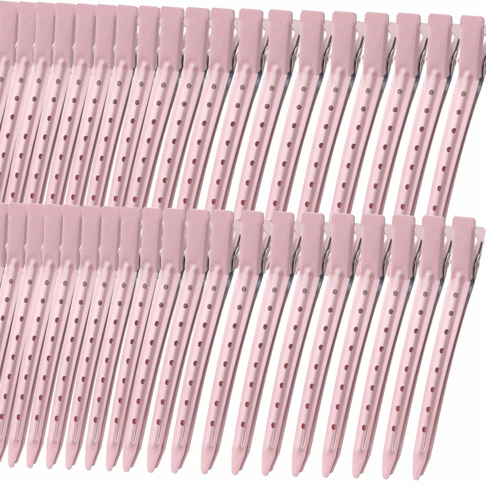Mythos pink duck-bill clip pack keeps hair tidy during styling.