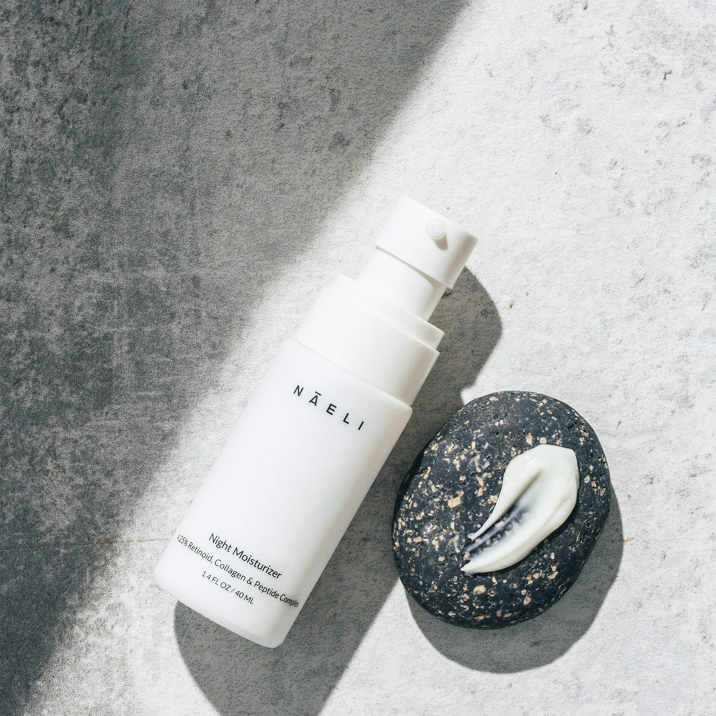 NAELI hyaluronic-acid-bottle-closeup hints at deeper hydration and plumper skin.