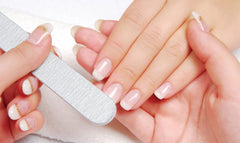 Nailtiques Formula 2 application two coats on nails demonstrates base coat versatility.