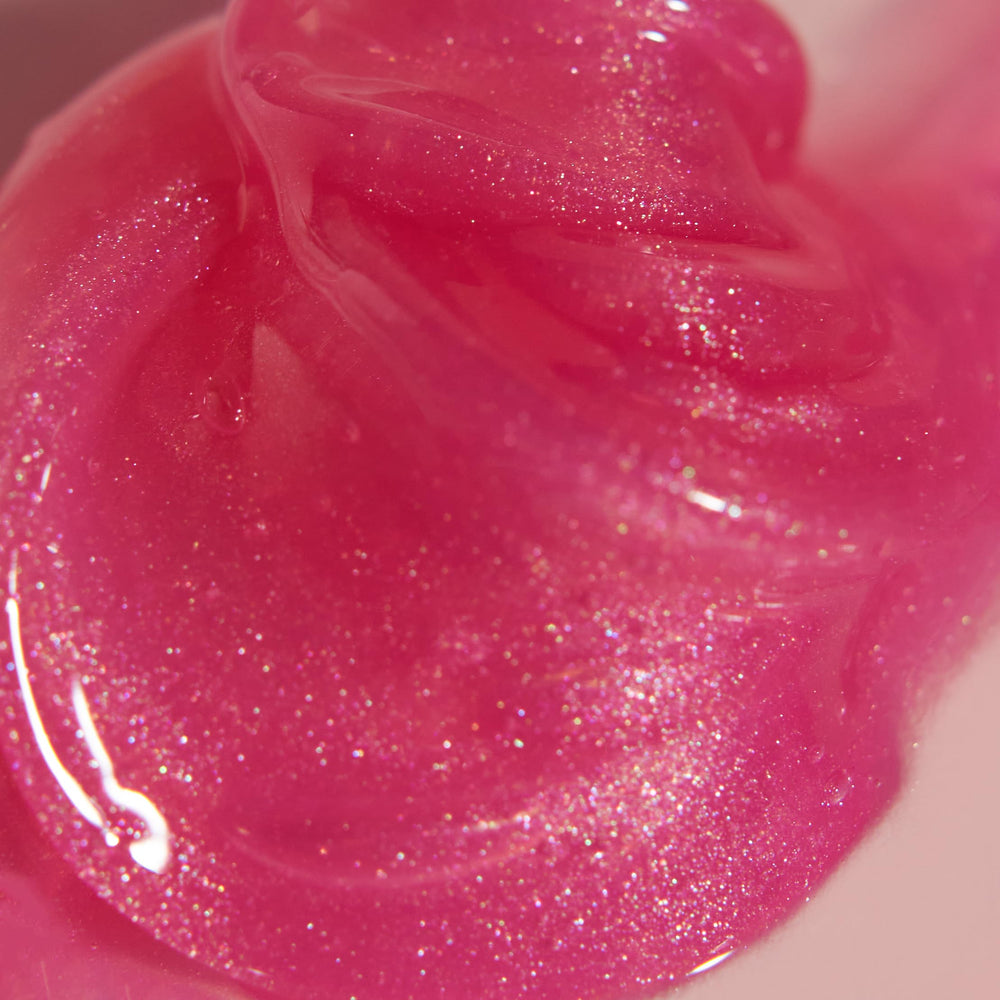 Naked Sundays PoutScreen finish closeup showing high-gloss lips without stickiness