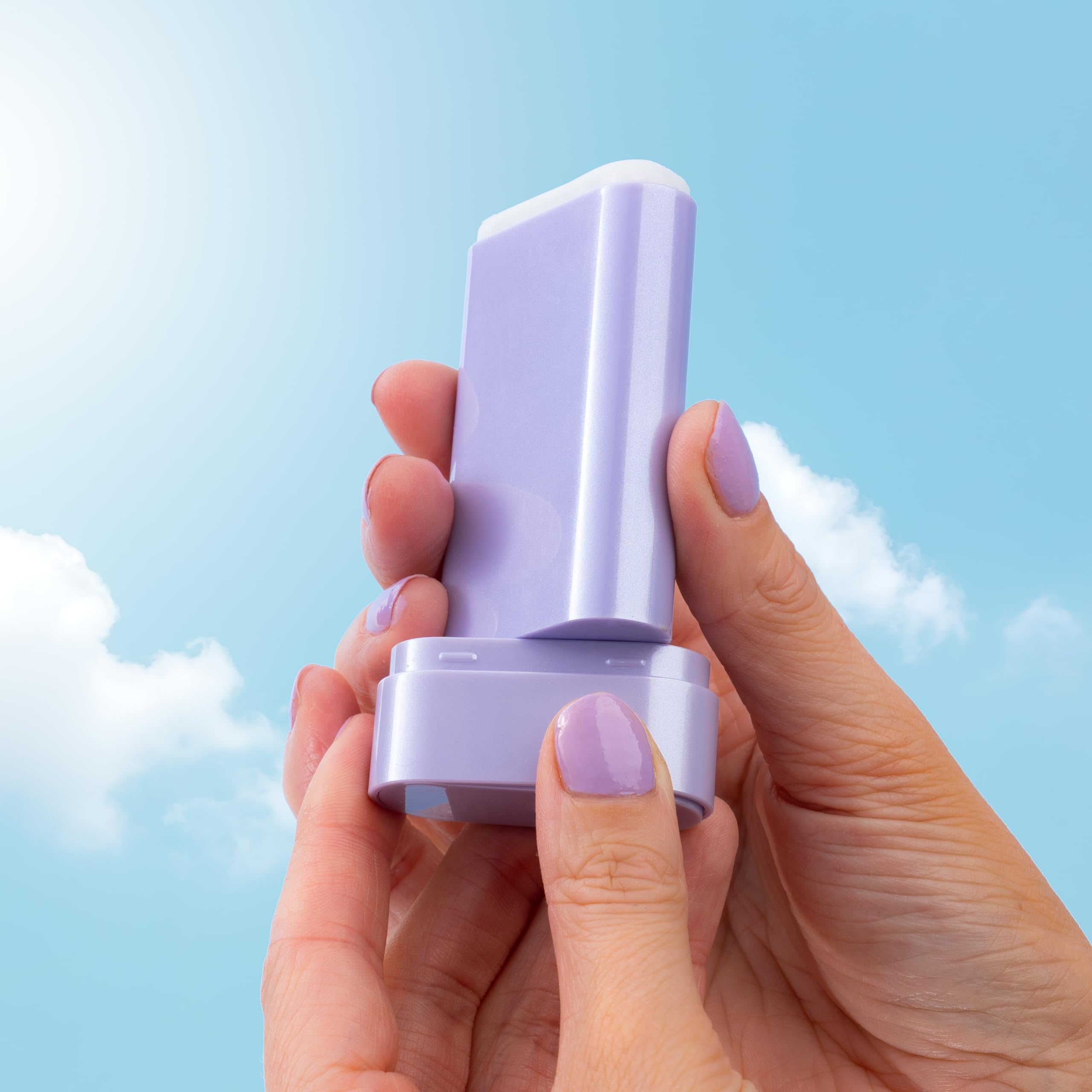 Naked Sundays travel-size sun stick fits in bags for quick SPF top-ups.
