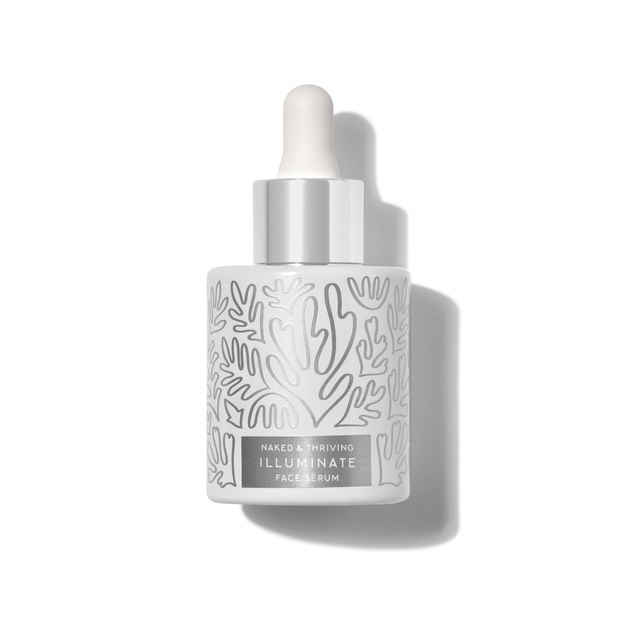 Naked & Thriving Illuminate BC+ closeup applying serum for glow