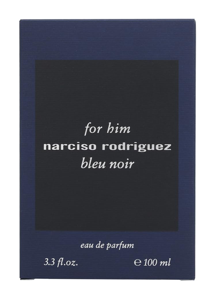 Narciso Rodriguez Bleu Noir bottle on nightstand suggests casual elegance.