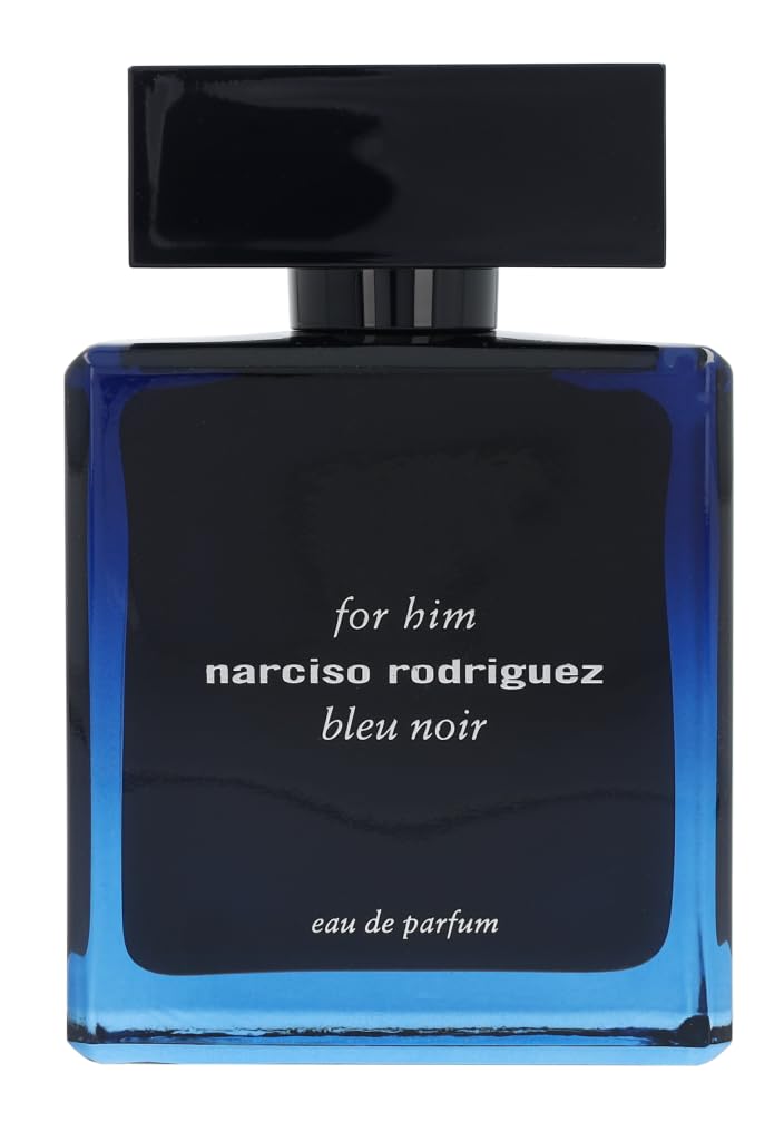 Narciso Rodriguez Bleu Noir spray mist on skin evokes musk and amber warmth.