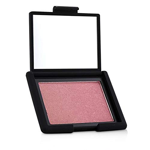 NARS Orgasm blush swirl swatch demonstrates buildable peach-pink glow.