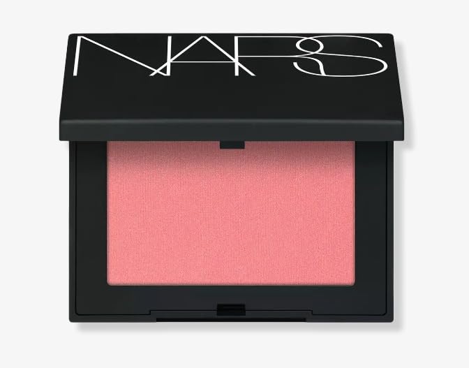 NARS Orgasm Edge blush powder in matte peachy pink adds radiant, natural-looking color for everyday glow.