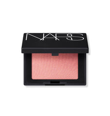 NARS Orgasm powder blush mini travel size delivers peachy-pink glow for on-the-go radiance.