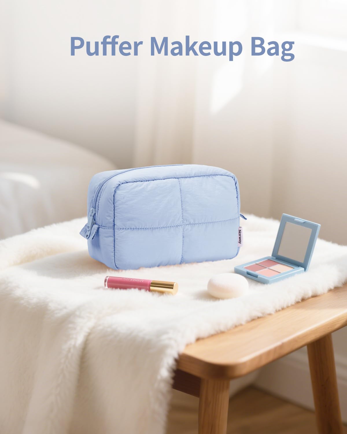 Narwey Puffy makeup bag blue stitching close-up conveys quality you can rely on for everyday routines.