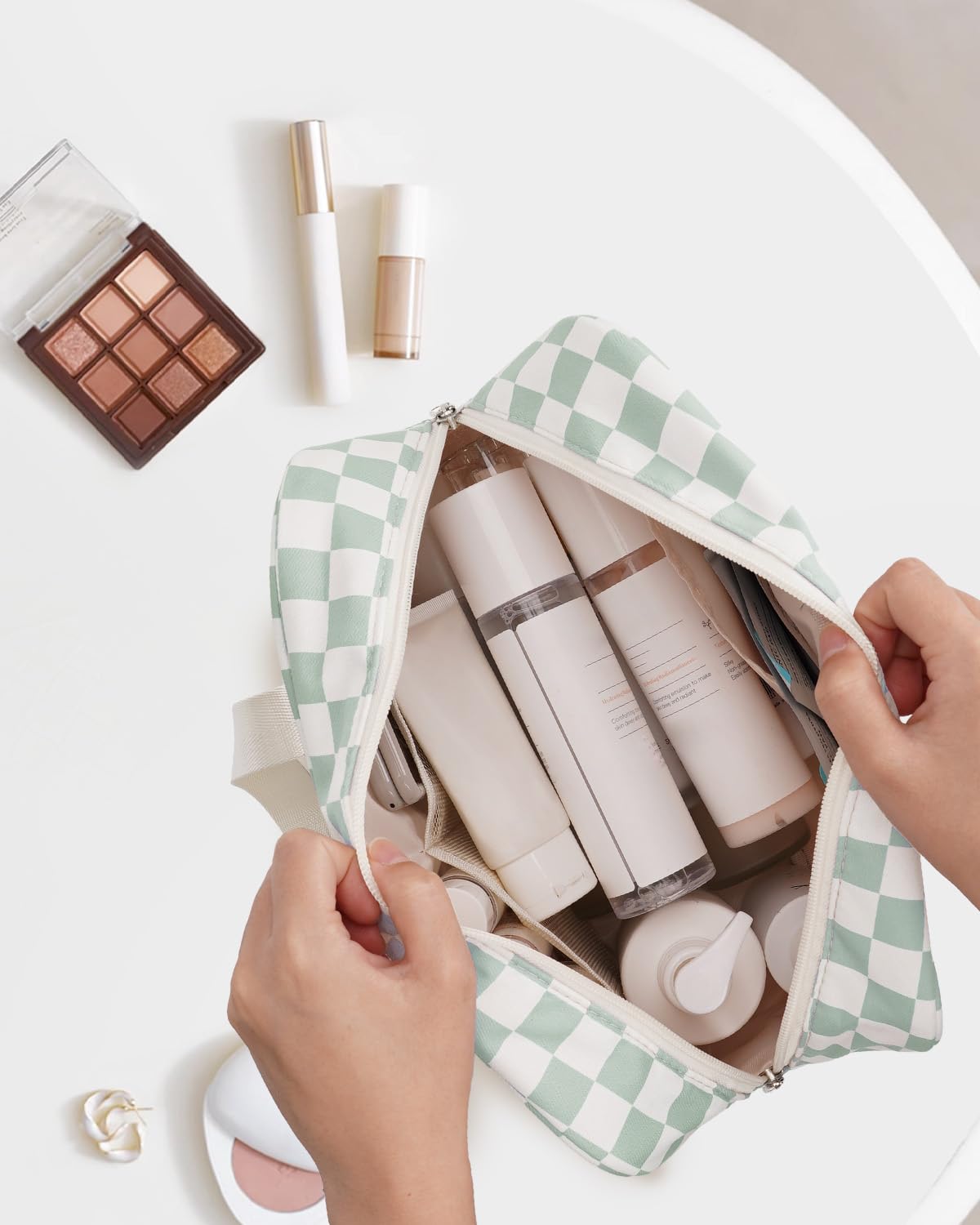 Narwey toiletry bag with checkered pattern; easy-access zipper for essentials.