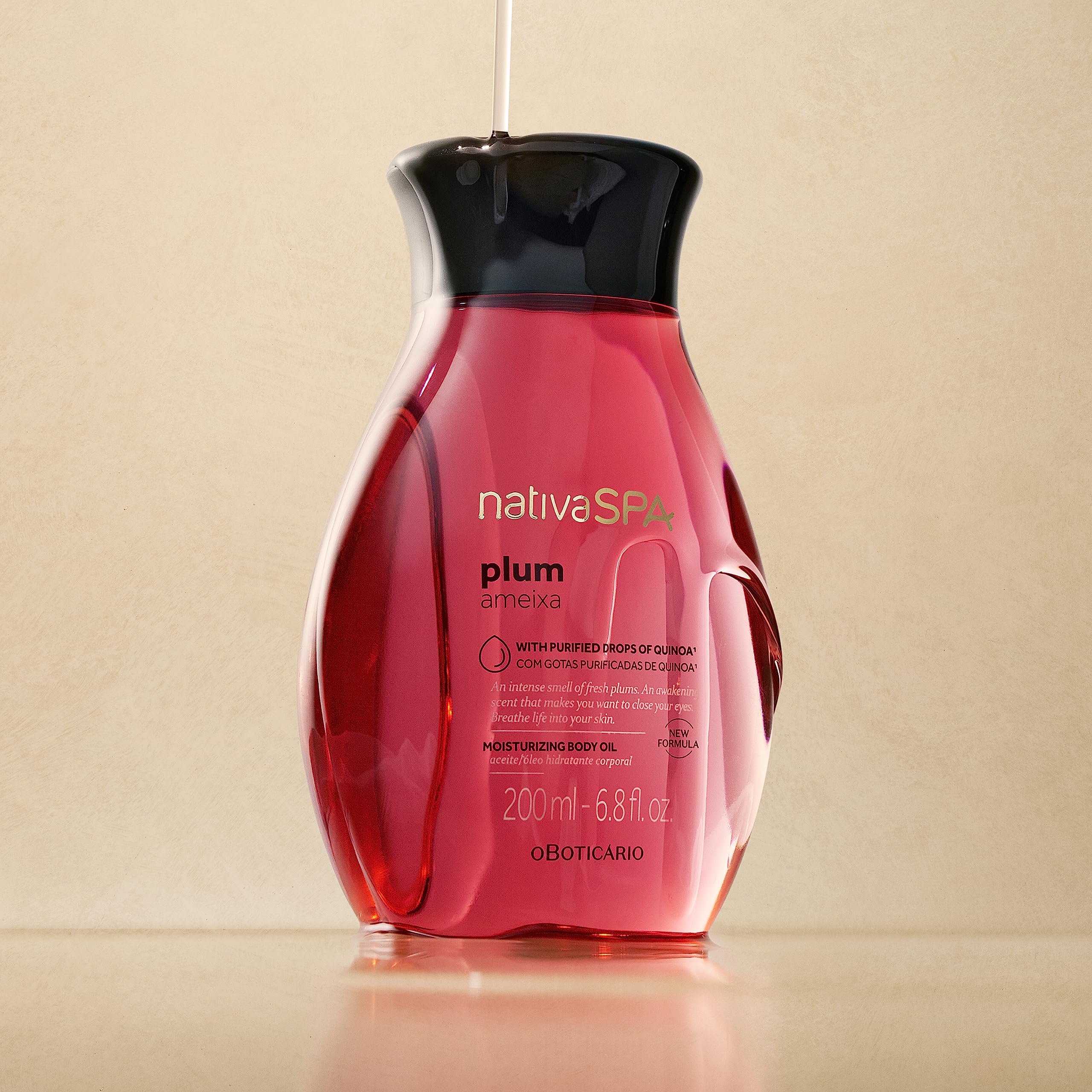 Pour action of NATIVA SPA Plum Body Oil emphasizes easy application