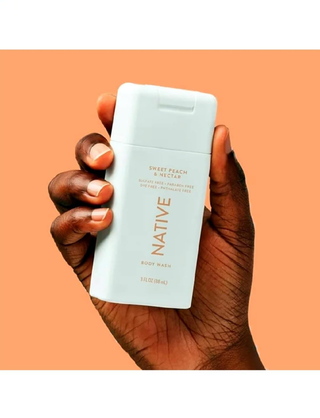 Native travel-size body wash Sweet Peach & Nectar bottle for travel-friendly cleansing and skin hydration