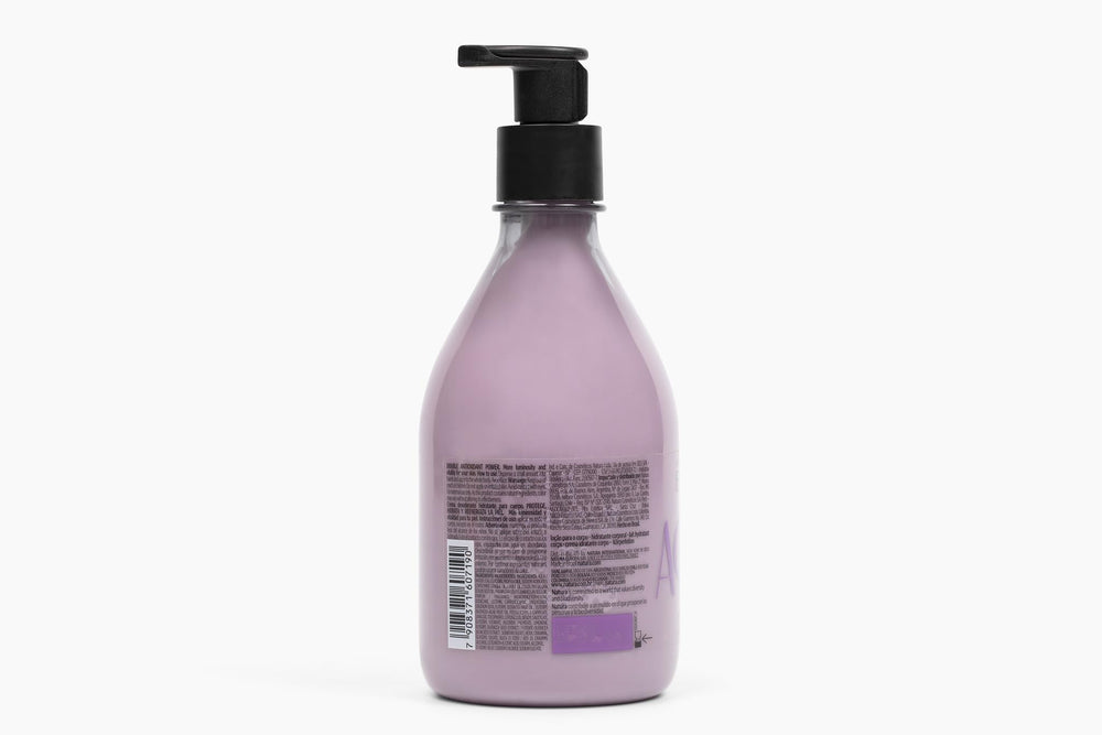 Natura Açaí Body Lotion applied to forearm for lasting moisture.
