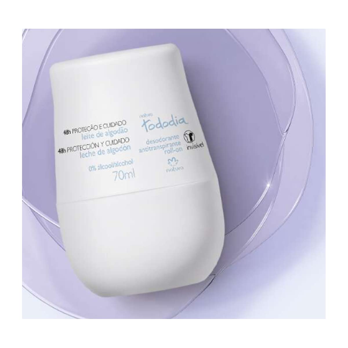 Natura Todo Dia Cotton Milk roll-on on forearm demonstrates easy, mess-free application.