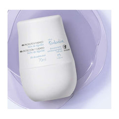 Natura Todo Dia Cotton Milk roll-on on forearm demonstrates easy, mess-free application.