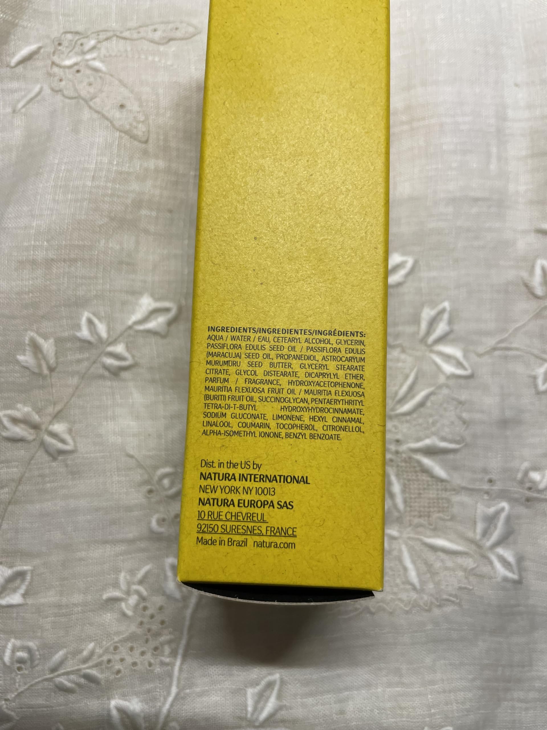 Natura Passion Fruit Hand Cream being applied on hands.