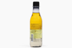 Natura Passion Fruit triple phase shake-bottle showing three-layer blend before use.