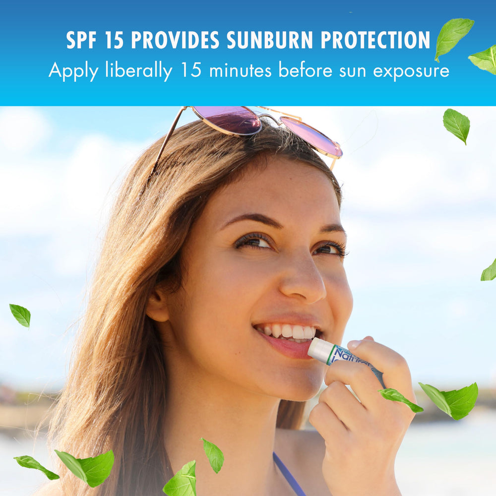 Natural Ice lip balm on a beach scene with sun protection vibe.