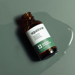 Natural Outcome Pure Squalane Oil on hair for smoother shine.