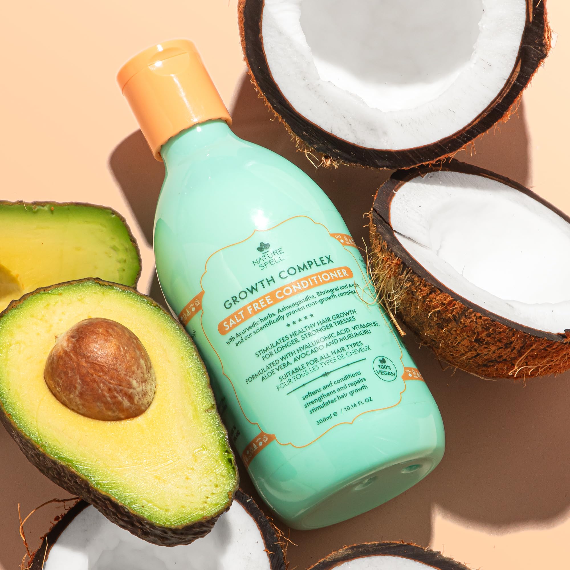  Nature Spell conditioner application close-up demonstrates even distribution on wet hair.