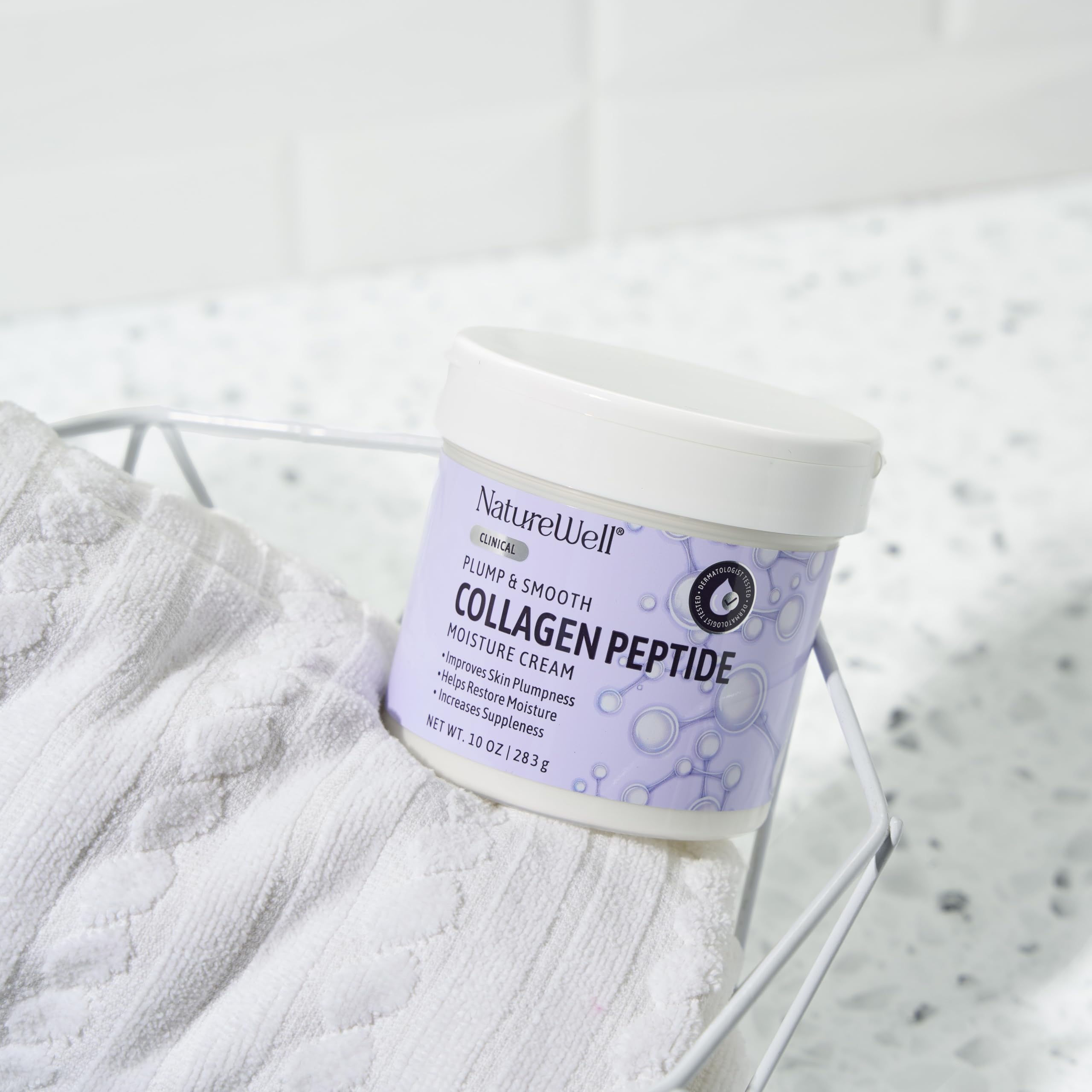 Nature Well cream on skin during application demonstrates non-greasy absorption.