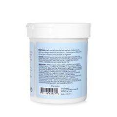 Nature Well retinol cream bottle close-up highlights hydrating, age-defying formula.